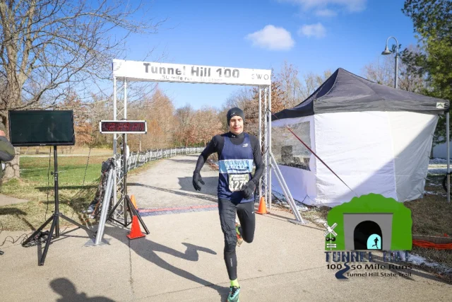 Matthew Kruger crossing the Tunnel Hill marathon finish line in 2022